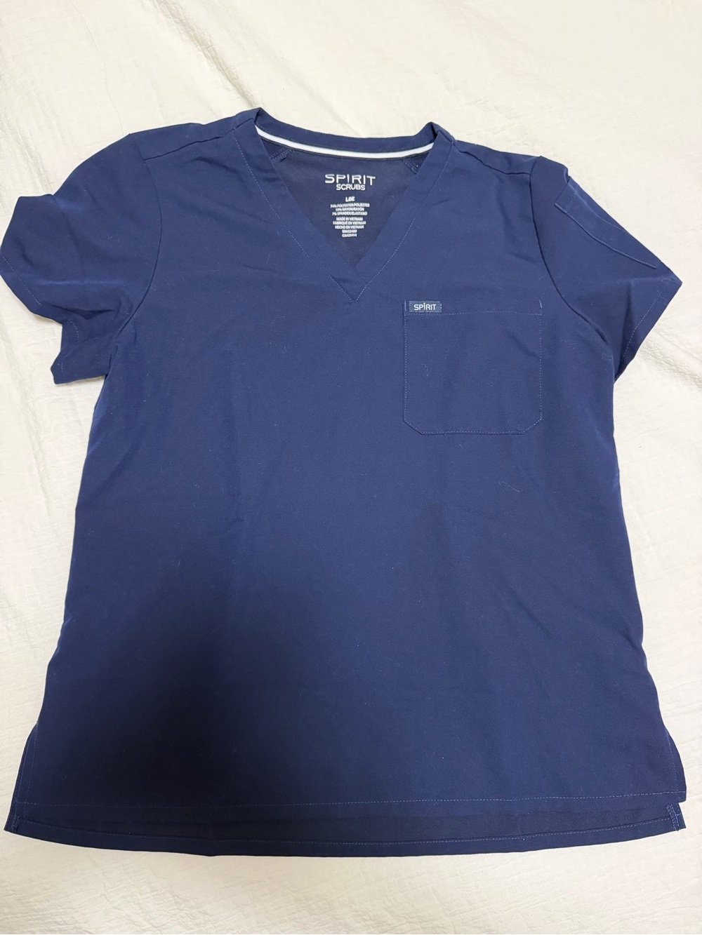 Spirit women’s V-Neck Scrub Top in Navy Blue with Chest Pocket